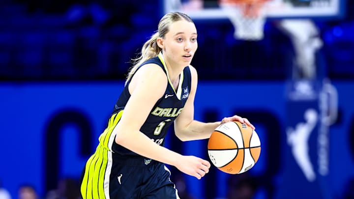 Jul 30, 2025; Arlington, Texas, USA;  Dallas Wings guard Paige Bueckers (5) dribbles against the Atlanta Dream during the second half at College Park Center. Mandatory Credit: Kevin Jairaj-Imagn Images