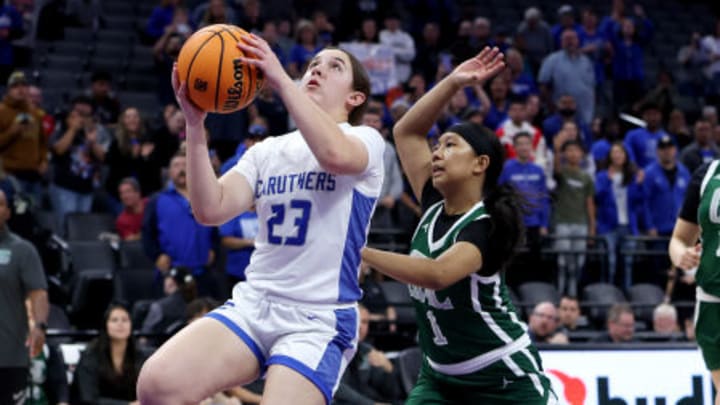 Emmi Almeida goes up for a layup in Caruthers' 54-48 state-championship win over Granada Hills Charter in 2024. Almeida had 21 points, nine rebounds and six assists in the game. 