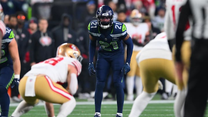 Jan 17, 2026; Seattle, WA, USA; Seattle Seahawks cornerback Devon Witherspoon (21) in his pre-snap stance against the San Francisco 49ers during the first half in an NFC Divisional Round game at Lumen Field. Mandatory Credit: Steven Bisig-Imagn Images