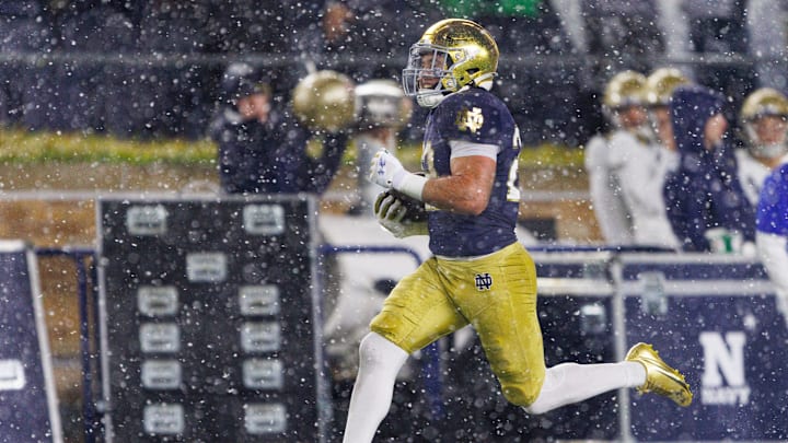 Notre Dame running back Aneyas Williams runs with the ball on his way to score a touchdown during the second half of a NCAA football game against Navy at Notre Dame Stadium on Saturday, Nov. 8, 2025, in South Bend.
