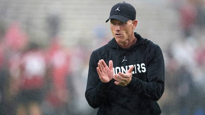 Oklahoma coach Brent Venables offers encouragement during warm-ups. Oklahoma coach Brent Venables offers encouragement during warm-ups.