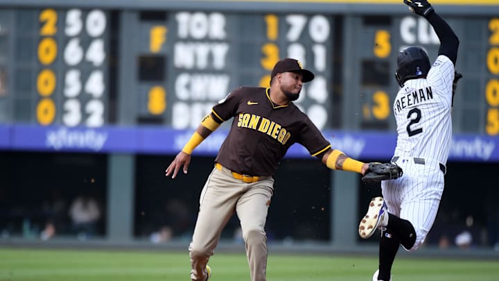 Sep 6, 2025; Denver, Colorado, USA; San Diego Padres first base Luis Arraez (4) tags out Colorado Rockies outfielder Tyler Freeman (2) on a play at first base during the first inning at Coors Field. Mandatory Credit: Christopher Hanewinckel-Imagn Images Sep 6, 2025; Denver, Colorado, USA; San Diego Padres first base Luis Arraez (4) tags out Colorado Rockies outfielder Tyler Freeman (2) on a play at first base during the first inning at Coors Field. Mandatory Credit: Christopher Hanewinckel-Imagn Images
