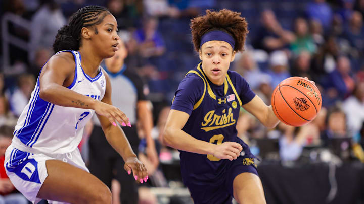 Mar 7, 2026; Duluth, GA, USA; Notre Dame Fighting Irish guard Hannah Hidalgo (3) drives on Duke Blue Devils guard Ashlon Jackson (3) in the first quarter at Gas South Arena. Mandatory Credit: Brett Davis-Imagn Images
