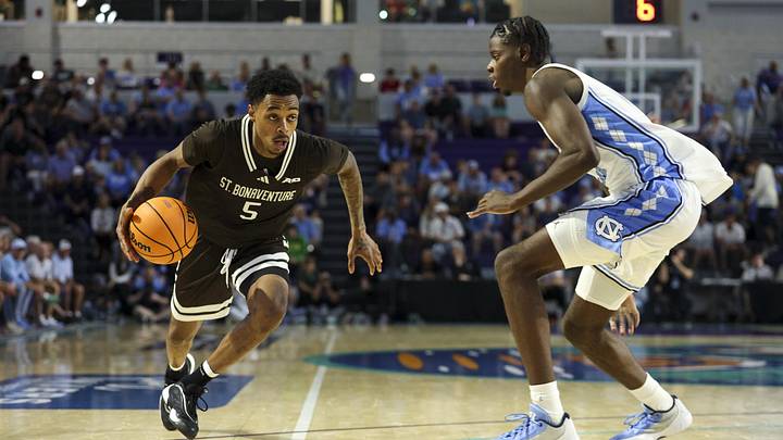 St. Bonaventure Bonnies guard Dasonte Bowen (5) moves the ball past North Carolina Tar Heels forward Caleb Wilson (8) in the second half at Suncoast Credit Union Arena. St. Bonaventure Bonnies guard Dasonte Bowen (5) moves the ball past North Carolina Tar Heels forward Caleb Wilson (8) in the second half at Suncoast Credit Union Arena.
