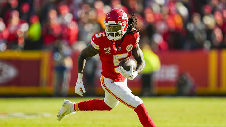 Dec 21, 2024; Kansas City, Missouri, USA; Kansas City Chiefs wide receiver Hollywood Brown (5) runs with the ball during the first half against the Houston Texans at GEHA Field at Arrowhead Stadium. Mandatory Credit: Jay Biggerstaff-Imagn Images
