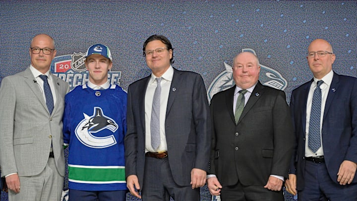 Jul 7, 2022; Montreal, Quebec, CANADA; Jonathan Lekkerimaki after being selected as the number fifteen overall pick to the Vancouver Canucks in the first round of the 2022 NHL Draft at Bell Centre. Mandatory Credit: Eric Bolte-Imagn Images