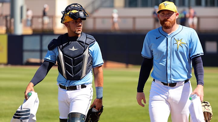 Feb 27, 2024; Port Charlotte, Florida, USA; Tampa Bay Rays catcher Rene Pinto (50) and pitcher Zack Littell (52) walk to the dugout before the game against the New York Yankees at Charlotte Sports Park. Mandatory Credit: Kim Klement Neitzel-Imagn Images Feb 27, 2024; Port Charlotte, Florida, USA; Tampa Bay Rays catcher Rene Pinto (50) and pitcher Zack Littell (52) walk to the dugout before the game against the New York Yankees at Charlotte Sports Park. Mandatory Credit: Kim Klement Neitzel-Imagn Images