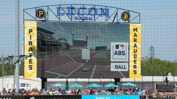 The scoreboard at LECOM Park displays a screen from the ABS challenge system, indicating the path of the challenged pitch and the strike zone for the individual player. Major League Baseball is testing an Automated Ball-Stike (ABS) challenge system at select spring training parks. The system allows players to challenge a limited number of ball/stike calls during a game. Calls can be overturned if the pitch tracking technology shows an umpire got a call wrong.