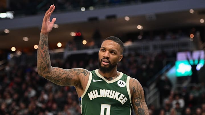 Dec 16, 2023; Milwaukee, Wisconsin, USA;  Milwaukee Bucks guard Damian Lillard (0) reacts after scoring a basket in the third quarter against the Detroit Pistons at Fiserv Forum. Mandatory Credit: Benny Sieu-Imagn Images