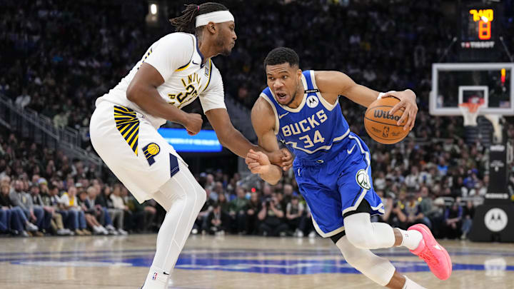 Mar 15, 2025; Milwaukee, Wisconsin, USA: Milwaukee Bucks forward Giannis Antetokounmpo (34) drives for the basket against Indiana Pacers center Myles Turner (33) during the fourth quarter at Fiserv Forum. Mandatory Credit: Jeff Hanisch-Imagn Images