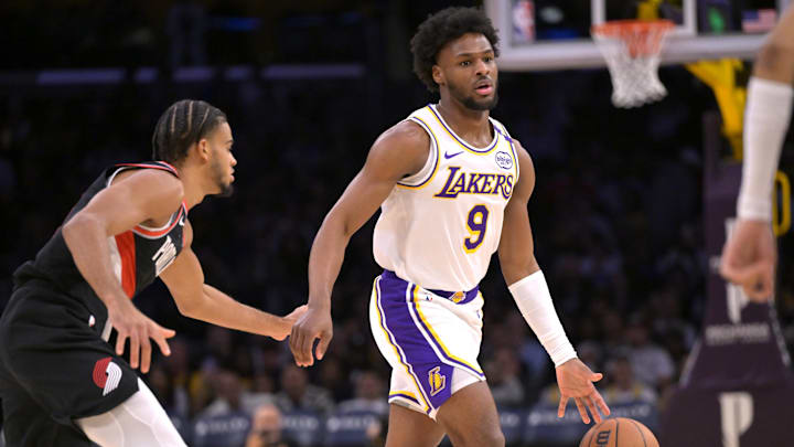 Dec 8, 2024; Los Angeles, California, USA;  Los Angeles Lakers guard Bronny James (9) handles the ball in the second half against the Portland Trail Blazers at Crypto.com Arena. Mandatory Credit: Jayne Kamin-Oncea-Imagn Images