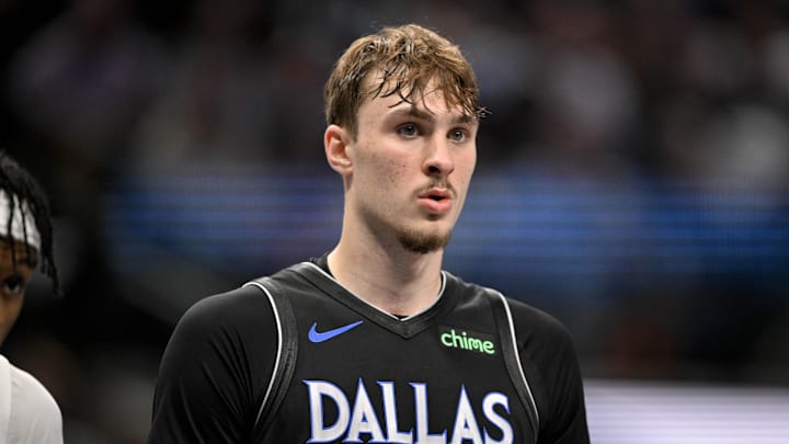 Nov 22, 2025; Dallas, Texas, USA; Dallas Mavericks forward Cooper Flagg (32) looks on during the second half against the Memphis Grizzlies at the American Airlines Center.