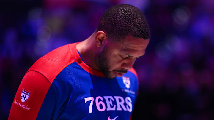Dec 6, 2024; Philadelphia, Pennsylvania, USA; Philadelphia 76ers guard Eric Gordon (23) observes the national anthem before the game against the Orlando Magic at Wells Fargo Center. Mandatory Credit: Kyle Ross-Imagn Images