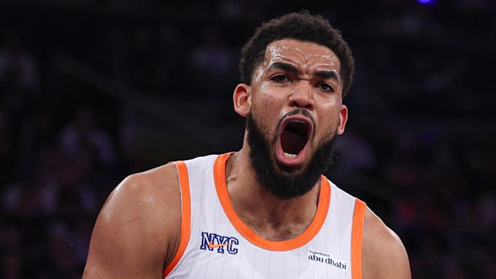 Mar 22, 2025; New York, New York, USA; New York Knicks center Karl-Anthony Towns (32) reacts during the first half against the Washington Wizards at Madison Square Garden. Mandatory Credit: Vincent Carchietta-Imagn Images