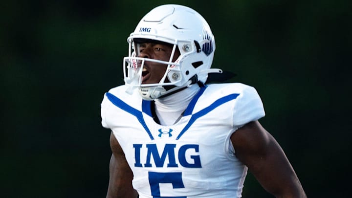 IMG's Gavin Nix (6) celebrates a stop against Lipscomb at Lipscomb's Reese Smith Football Field in Nashville, Tenn., Friday night, Aug. 18, 2023. IMG went on to win the game 35-10.