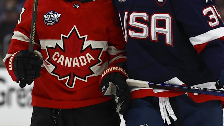 Feb 20, 2025; Boston, MA, USA; [Imagn Images direct customers only]  The Team Canada logo and the United States logo are seen during the 4 Nations Face-Off ice hockey championship game at TD Garden. Mandatory Credit: Winslow Townson-Imagn Images