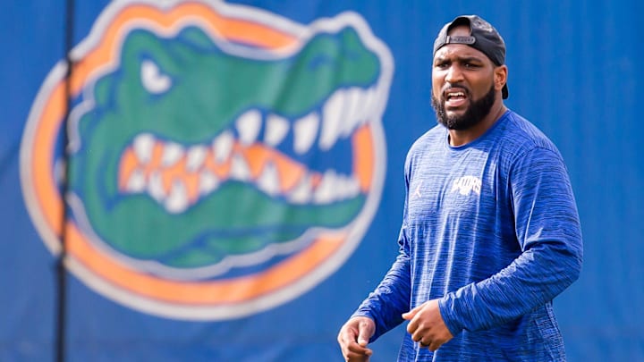 A departing coach is turning up the temperature in the rivalry between Florida and Miami
