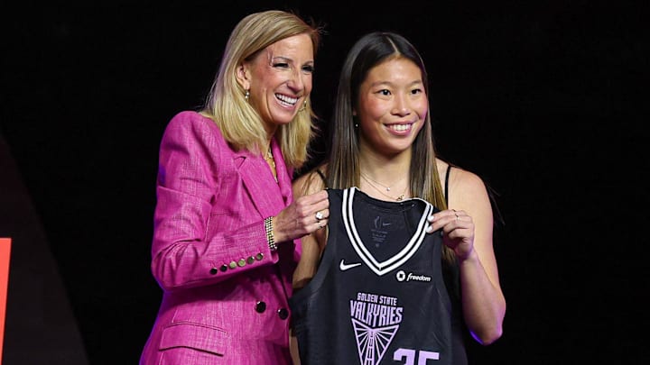 Apr 14, 2025; New York, New York, USA; Kaitlyn Chen poses with WNBA commissioner Cathy Engelbert after being selected with the number thirty overall pick to the Golden State Valkyries in the 2025 WNBA Draft at The Shed at Hudson Yards. Mandatory Credit: Vincent Carchietta-Imagn Images Apr 14, 2025; New York, New York, USA; Kaitlyn Chen poses with WNBA commissioner Cathy Engelbert after being selected with the number thirty overall pick to the Golden State Valkyries in the 2025 WNBA Draft at The Shed at Hudson Yards. Mandatory Credit: Vincent Carchietta-Imagn Images