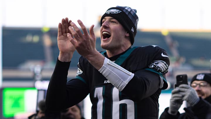 Jan 5, 2025; Philadelphia, Pennsylvania, USA; Philadelphia Eagles quarterback Tanner McKee (16) claps his hands as he walks off the field after a victory against the New York Giants at Lincoln Financial Field. Mandatory Credit: Bill Streicher-Imagn Images