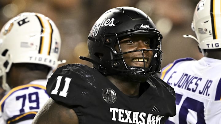 Oct 26, 2024; College Station, Texas, USA; Texas A&M Aggies defensive lineman Nic Scourton (11) reacts against the LSU Tigers during the fourth quarter. The Aggies defeated the Tigers 38-23; at Kyle Field. Mandatory Credit: Maria Lysaker-Imagn Images.  
