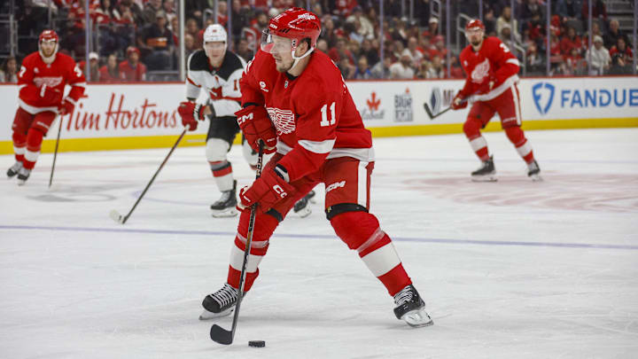 Nov 29, 2024; Detroit, Michigan, USA; Detroit Red Wings right wing Vladimir Tarasenko (11) handles the puck during the second period against the New Jersey Devils at Little Caesars Arena. Mandatory Credit: Brian Bradshaw Sevald-Imagn Images
