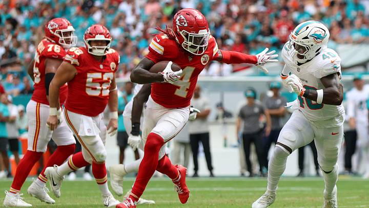 Kansas City Chiefs wide receiver Rashee Rice (4) runs with the ball against Miami Dolphins linebacker Willie Gay Jr. (40) during the fourth quarter at Hard Rock Stadium. Kansas City Chiefs wide receiver Rashee Rice (4) runs with the ball against Miami Dolphins linebacker Willie Gay Jr. (40) during the fourth quarter at Hard Rock Stadium.