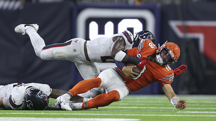 Texans linebacker Azeez Al-Shaair sacks quarterback Caleb Williams during Sunday night's 19-13 Bears loss. Texans linebacker Azeez Al-Shaair sacks quarterback Caleb Williams during Sunday night's 19-13 Bears loss.