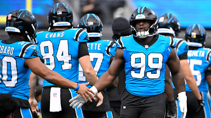 Oct 26, 2025; Charlotte, North Carolina, USA; Carolina Panthers defensive tackle Tershawn Wharton (99) runs on to the field before the game at Bank of America Stadium. Oct 26, 2025; Charlotte, North Carolina, USA; Carolina Panthers defensive tackle Tershawn Wharton (99) runs on to the field before the game at Bank of America Stadium.