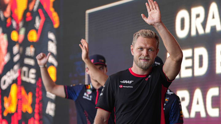 MoneyGram Haas driver Kevin Magnussen waves to the crowd as he leaves the stage during driver engagements in the Germania Insurance Amphitheater at Circuit of Americas on Saturday Oct. 21, 2023 ahead of the Formula 1 Lenovo United States Grand Prix on Sunday.