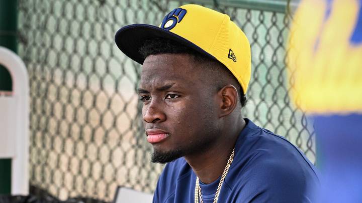 Milwaukee Brewers outfielder Luis Lara sits in the dugout during spring training workouts Monday, February 17, 2025, at American Family Fields of Phoenix in Phoenix, Arizona. Milwaukee Brewers outfielder Luis Lara sits in the dugout during spring training workouts Monday, February 17, 2025, at American Family Fields of Phoenix in Phoenix, Arizona.