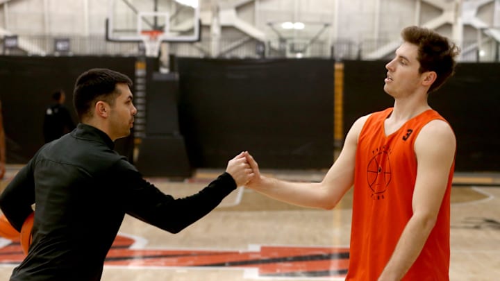 Princeton University Assistant Coach Brett MacConnell is shwon with Guard Ryan Langborg on the court at the University's Jadwin Gym Monday afternoon, March 20, 2023.  The team were preparing for their NCAA Sweet 16 appearance.

Basketball Princeton Men S Basketball Sweet 16 Team Practice