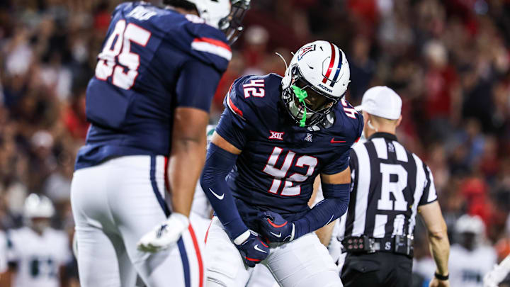 Aug 30, 2025; Tucson, Arizona, USA; Arizona Wildcats defensive lineman Dominic Lolesio (42) celebrates after a tackle during the third quarter of the game against the Hawaii Rainbow Warriors at Arizona Stadium. Mandatory Credit: Aryanna Frank-Imagn Images Aug 30, 2025; Tucson, Arizona, USA; Arizona Wildcats defensive lineman Dominic Lolesio (42) celebrates after a tackle during the third quarter of the game against the Hawaii Rainbow Warriors at Arizona Stadium. Mandatory Credit: Aryanna Frank-Imagn Images