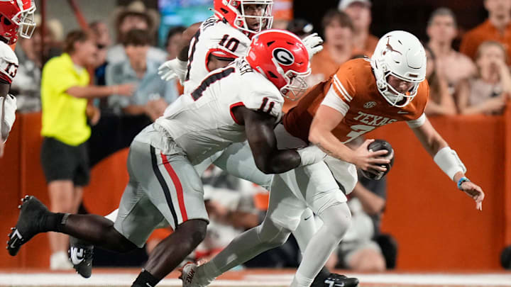 Georgia Bulldogs linebacker Jalon Walker sacks Texas Longhorns quarterback Quinn Ewers in the second quarter at Darrell K Royal-Texas Memorial Stadium Saturday October 19, 2024.