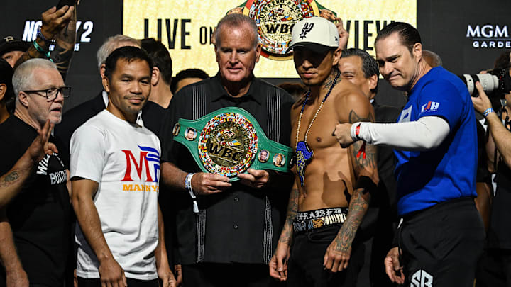 Manny Pacquiao (left) and Mario Barrios (right) at weigh ins ahead of their fight.