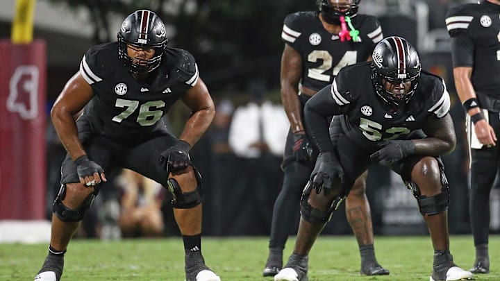 Sep 6, 2025; Starkville, Mississippi, USA; Mississippi State Bulldogs offensive lineman Albert Reese IV (76) and offensive lineman Zack Owens (52) wait for the snap during the second quarter against the Arizona State Sun Devils at Davis Wade Stadium at Scott Field. Mandatory Credit: Petre Thomas-Imagn Images