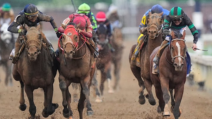 Near the finish line, jockey Tyler Gaffalione, left, and Forever Young's jockey Ryusei Sakai crowd after the two horses bumped and Mystik Dan with jockey Brian J. Hernandez, right, won the 2024 Kentucky Derby at Churchill Downs Saturday, May 4, 2024 in Louisville, Kentucky. Near the finish line, jockey Tyler Gaffalione, left, and Forever Young's jockey Ryusei Sakai crowd after the two horses bumped and Mystik Dan with jockey Brian J. Hernandez, right, won the 2024 Kentucky Derby at Churchill Downs Saturday, May 4, 2024 in Louisville, Kentucky.