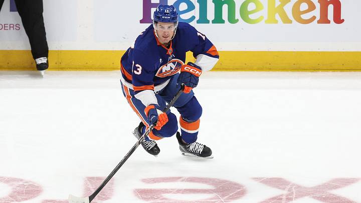 Mar 26, 2026; Elmont, New York, USA;  New York Islanders center Mathew Barzal (13) controls the puck in the first period against the Dallas Stars at UBS Arena. Mandatory Credit: Wendell Cruz-Imagn Images
