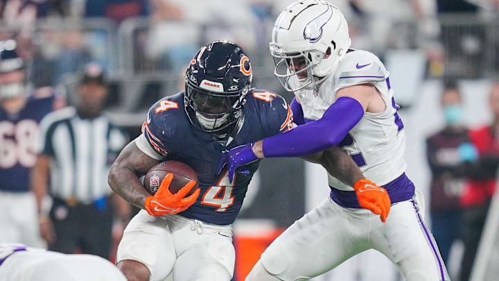 Dec 16, 2024; Minneapolis, Minnesota, USA; Chicago Bears running back D'Andre Swift (4) runs with the ball against the Minnesota Vikings in the third quarter at U.S. Bank Stadium. Mandatory Credit: Brad Rempel-Imagn Images