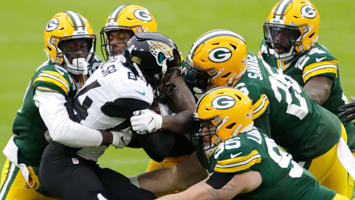 Jacksonville Jaguars wide receiver Keelan Cole (84) is brought down by the Green Bay Packers defense during the first quarter on November 15, 2020, at Lambeau Field in Green Bay, Wis.