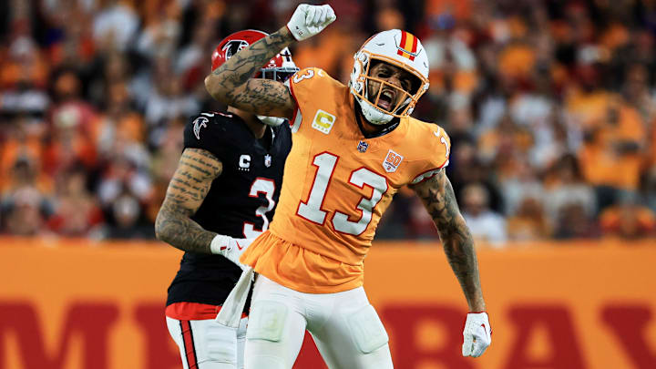 Dec 11, 2025; Tampa, Florida, USA; Tampa Bay Buccaneers wide receiver Mike Evans (13) reacts after catching a pass against Atlanta Falcons safety Jessie Bates III (3) (obscured) during the third quarter at Raymond James Stadium. Mandatory Credit: Kim Klement Neitzel-Imagn Images Dec 11, 2025; Tampa, Florida, USA; Tampa Bay Buccaneers wide receiver Mike Evans (13) reacts after catching a pass against Atlanta Falcons safety Jessie Bates III (3) (obscured) during the third quarter at Raymond James Stadium. Mandatory Credit: Kim Klement Neitzel-Imagn Images