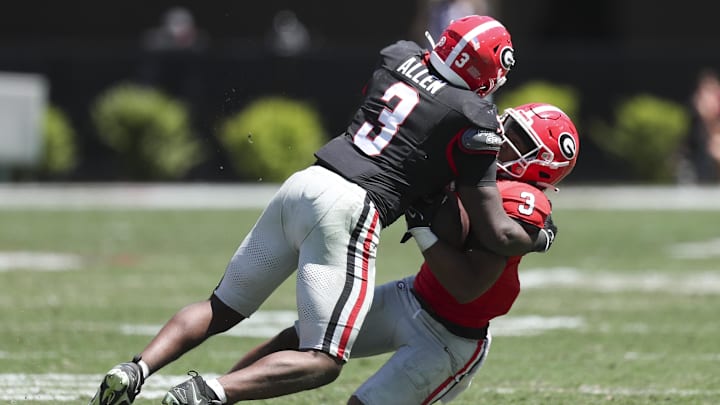 Apr 13, 2024; Athens, GA, USA; Georgia Bulldogs inside linebacker CJ Allen (3) tackles running back Andrew Paul (3) during the G-Day Game at Sanford Stadium. Mandatory Credit: Mady Mertens-Imagn Images
