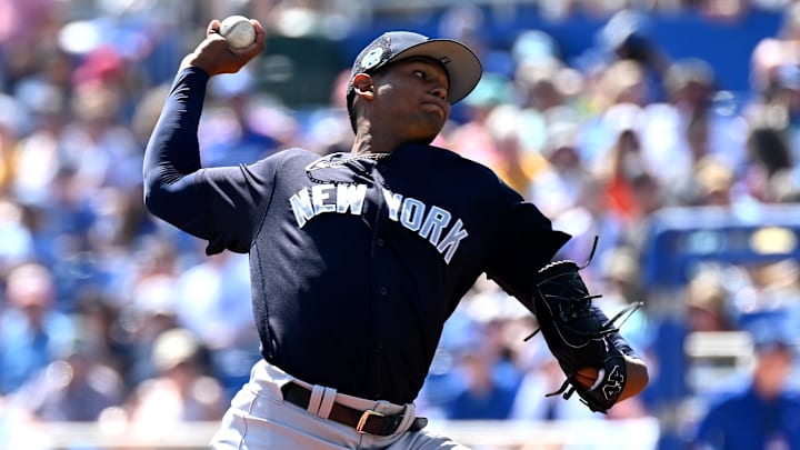 Feb 26, 2023; Dunedin, Florida, USA; New York Yankees pitcher Jhony Brito (76) throws a pitch in the