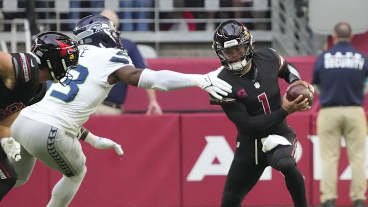 Arizona Cardinals quarterback Kyler Murray (1) is pressured by Seattle Seahawks linebacker Boye Mafe (53) during the second quarter at State Farm Stadium in Glendale on Dec. 8, 2024.