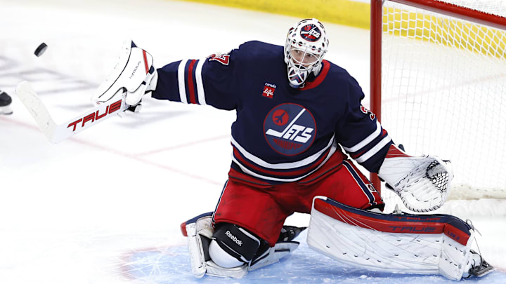 Nov 7, 2024; Winnipeg, Manitoba, CAN; Winnipeg Jets goaltender Connor Hellebuyck (37) makes a save in the third period against the Colorado Avalanche at Canada Life Centre. Mandatory Credit: James Carey Lauder-Imagn Images Nov 7, 2024; Winnipeg, Manitoba, CAN; Winnipeg Jets goaltender Connor Hellebuyck (37) makes a save in the third period against the Colorado Avalanche at Canada Life Centre. Mandatory Credit: James Carey Lauder-Imagn Images