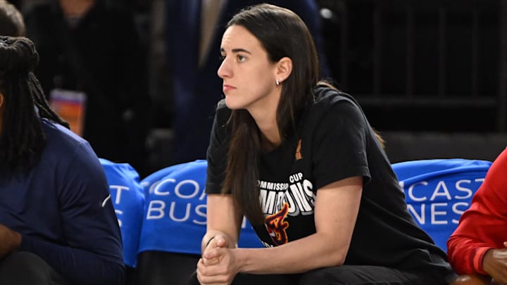 Sep 7, 2025; Baltimore, MD, USA; Indiana Fever guard Caitlin Clark (22) looks on from the bench against the Washington Mystics during the first quarter at CFG Bank Arena. Mandatory Credit: Rafael Suanes-Imagn Images