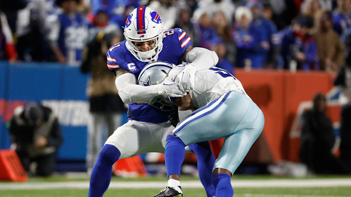 Buffalo Bills safety Jordan Poyer (21) makes a tackle on Dallas Cowboys wide receiver Brandin Cooks (3).
