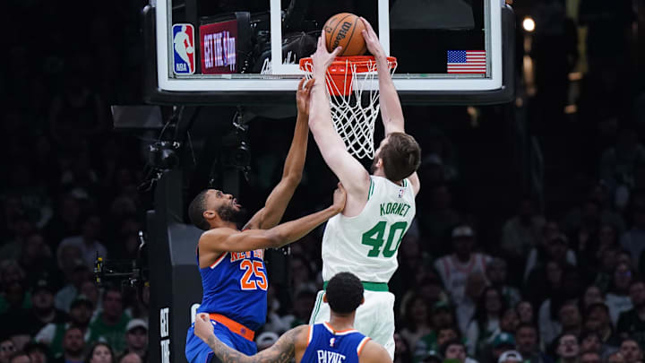 May 5, 2025; Boston, Massachusetts, USA; Boston Celtics center Luke Kornet (40) makes the basket against New York Knicks forward Mikal Bridges (25) in the first quarter during game one of the second round for the 2025 NBA Playoffs at TD Garden. Mandatory Credit: David Butler II-Imagn Images May 5, 2025; Boston, Massachusetts, USA; Boston Celtics center Luke Kornet (40) makes the basket against New York Knicks forward Mikal Bridges (25) in the first quarter during game one of the second round for the 2025 NBA Playoffs at TD Garden. Mandatory Credit: David Butler II-Imagn Images