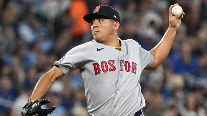 Apr 27, 2026; Toronto, Ontario, CAN;  Boston Red Sox starting pitcher Ranger Suarez (55) delivers a pitch against the Toronto Blue Jays in the second inning at Rogers Centre. Mandatory Credit: Dan Hamilton-Imagn Images