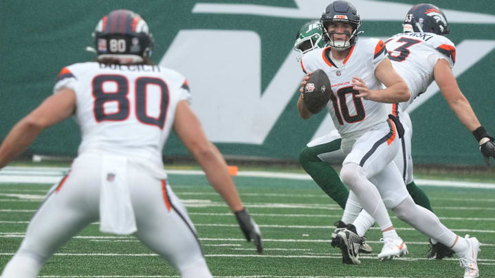 East Rutherford, NJ -- September 29 -- Quarterback, Bo Nix of Denver looks to throw to Greg Dulcich in the first half as the Denver Broncos edged the New York Jets 10-9 at MetLife Stadium East Rutherford, NJ -- September 29 -- Quarterback, Bo Nix of Denver looks to throw to Greg Dulcich in the first half as the Denver Broncos edged the New York Jets 10-9 at MetLife Stadium
