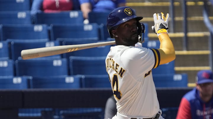 Apr 3, 2022; Phoenix, Arizona, USA; Milwaukee Brewers left fielder Andrew McCutchen (24) hits against the Texas Rangers in the first inning during a spring training game at American Family Fields of Phoenix. Mandatory Credit: Rick Scuteri-Imagn Images Apr 3, 2022; Phoenix, Arizona, USA; Milwaukee Brewers left fielder Andrew McCutchen (24) hits against the Texas Rangers in the first inning during a spring training game at American Family Fields of Phoenix. Mandatory Credit: Rick Scuteri-Imagn Images